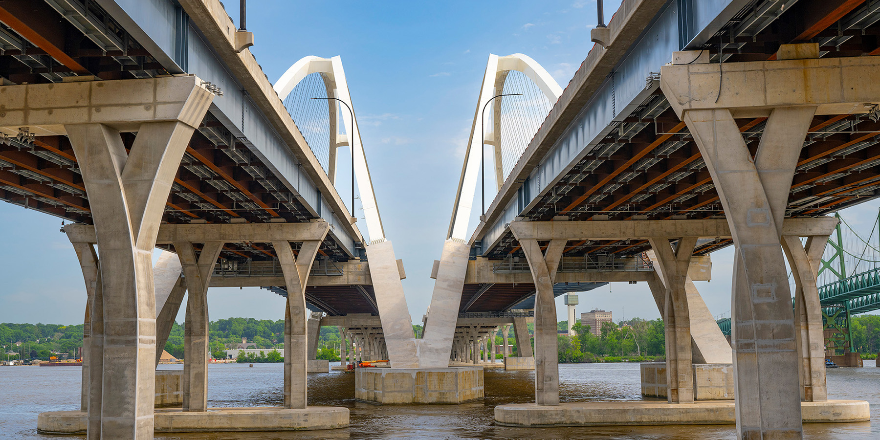 A photo of the I-74 Mississippi River Bridge from underneath the bridges