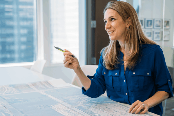 Jill Hayes working on a set of plans for Randall Road Multimodal Improvements Project