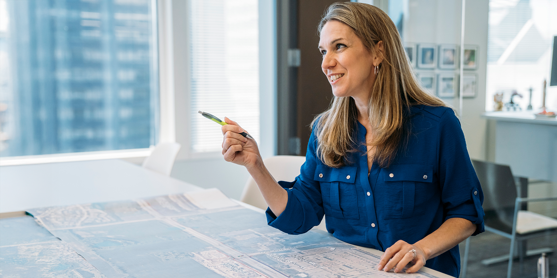 Jill Hayes working on a set of plans for Randall Road Multimodal Improvements Project