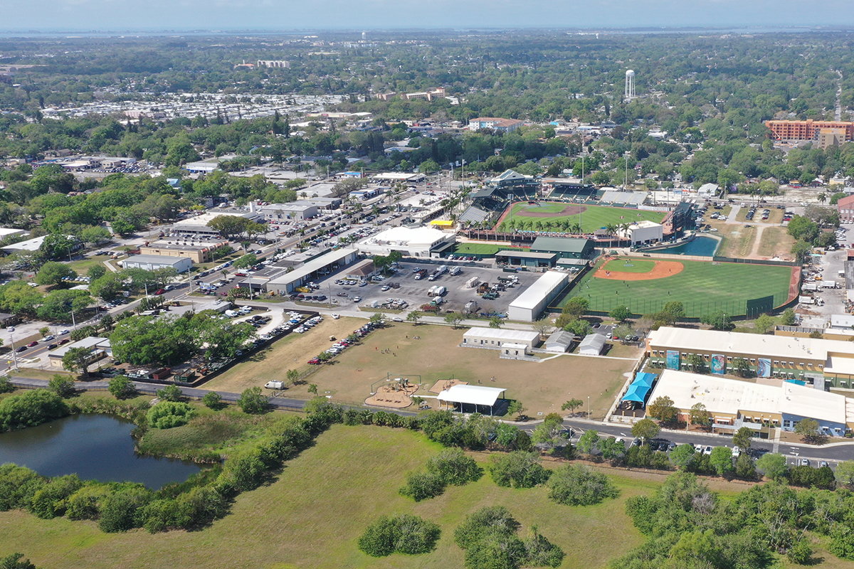 Drone image of city with baseball stadium