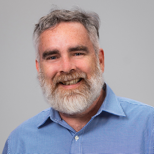 Photo of Demian Miller on grey background