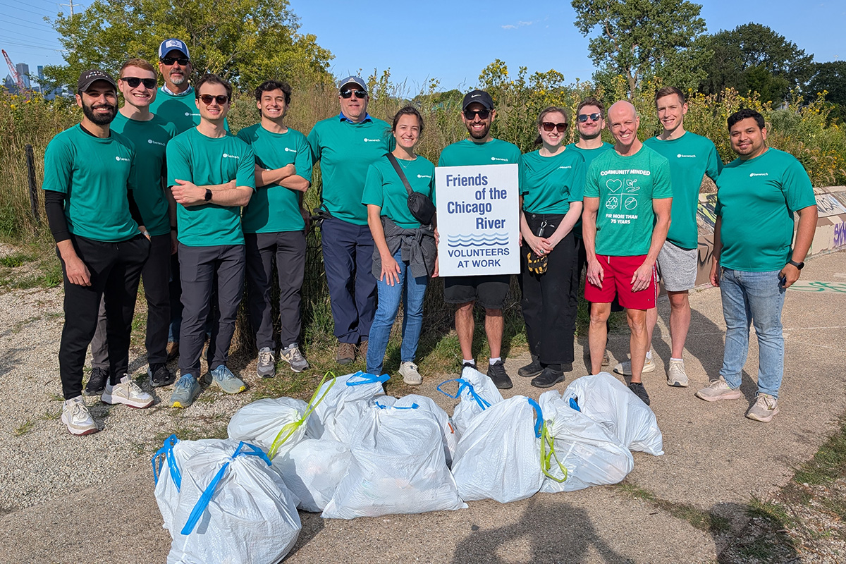 Chicago team poses with litter they cleaned up from the Chicago River