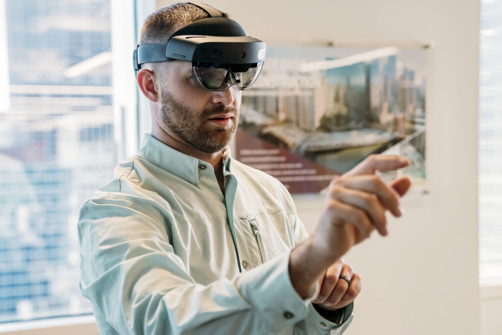 Benesch employee wearing augmented reality goggles