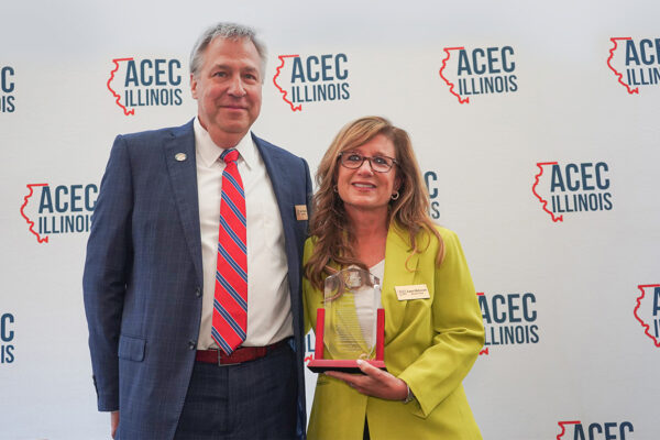 Laura McGovern holding ACEC IL Chair Award
