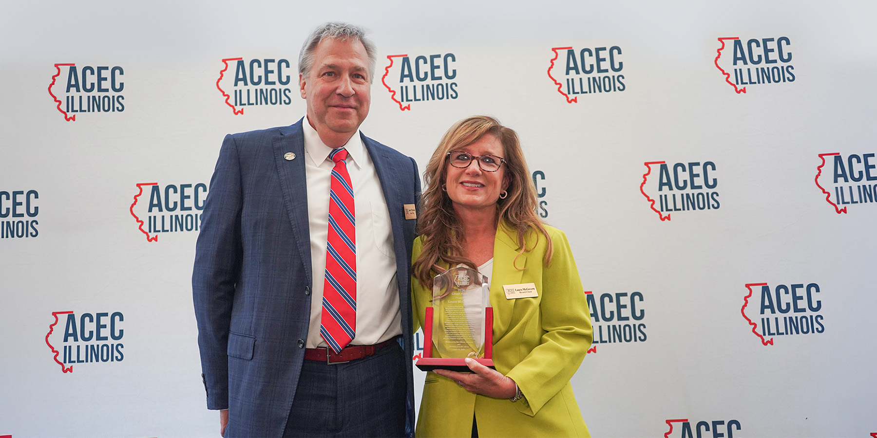 Laura McGovern holding ACEC IL Chair Award