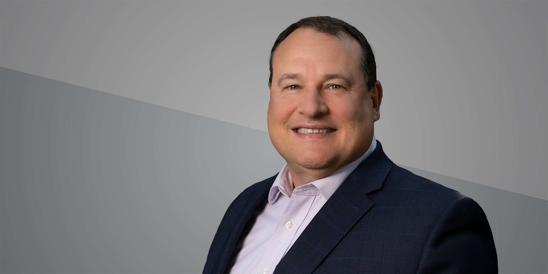headshot image of Ken McClain